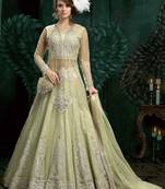 green embroidered net ethnic suits with matching dupatta