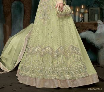 green embroidered net ethnic suits with matching dupatta 2