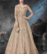 gold embroidered net ethnic suits with matching dupatta