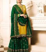 Yellow embroidered Satin & Georgette sharara suit