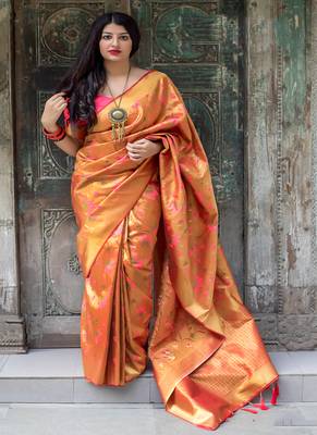 Orange woven silk blend saree with blouse 1