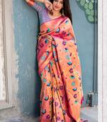 Peach woven silk blend saree with blouse