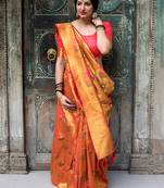 Orange woven silk blend saree with blouse