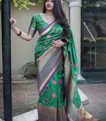 Green woven banarasi art silk blend saree with blouse
