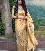 Cream woven banarasi art silk blend saree with blouse