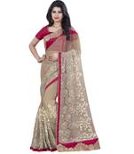 Cream Embroidered Net Saree With Blouse