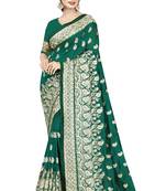 Dark green embroidered art silk saree with blouse