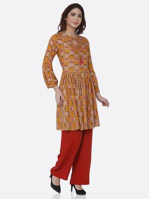 Yellow printed rayon kurtas-and-kurtis 3