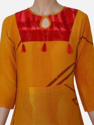 Yellow printed rayon kurtas-and-kurtis 5