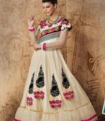 Cream embroidered net salwar with dupatta