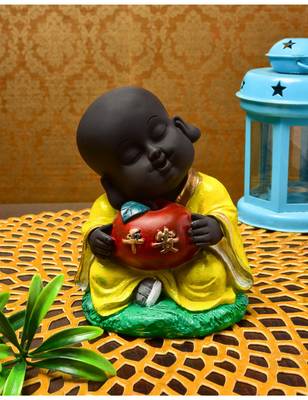 Karigaari India Handcrafted Resine Little Yellow Buddha Monk Sculpture 1