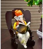 Karigaari India Handcrafted Resine Reading Book on Wooden Chair Ganesha Idol Sculpture
