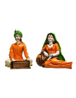 Karigaari India Handcrafted Traditions of Rajasthani Lady in Resting Posture and Man Playing Harmonium Polyresine 1