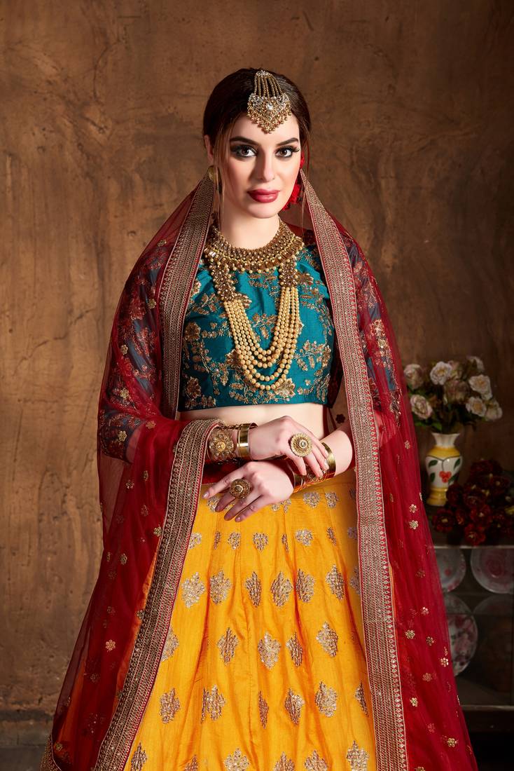 Fetching Yellow Red And Green Colored Zari & Sequins Embroidered Taffeta Silk Semi Stitched Wedding Lehenga