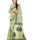 Light parrot green printed satin saree with blouse