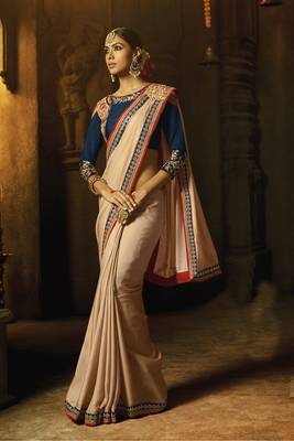 Chiku Embroidered Silk Blend Saree With Blouse 1