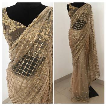 Beige sequin embroidered net saree With Blouse 2