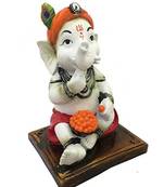 Karigaari Dhoti Baby Ganesha Eating Ladoo Resine Idol (0.15 cm x 0.1 cm x 0.08 cm)
