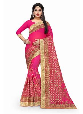 Rani pink embroidered georgette saree with blouse 1