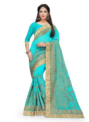Sky blue embroidered georgette saree with blouse 1