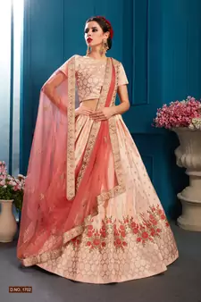 Mesmerizing Peach Colored Resham And Zari Embroidered with stone work Satin fabric lehenga choli for bride