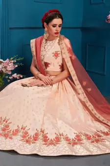 Mesmerizing Peach Colored Resham And Zari Embroidered with stone work Satin fabric lehenga choli for bride