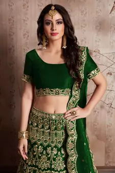Green Zari And Sequins Embroidered Semi Velvet Designer Wedding Lehenga 