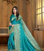 Green embroidered silk saree with blouse