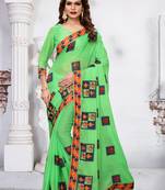 Light green embroidered silk saree with blouse