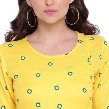 Yellow printed rayon kurtas-and-kurtis 5
