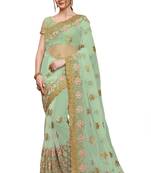 Light sky blue embroidered net saree with blouse