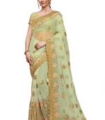 Light green embroidered net saree with blouse