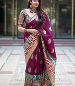Wine woven banarasi silk blend saree with blouse