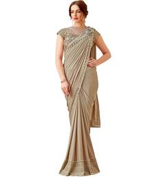 Beige plain lycra saree with blouse Mahotsav E Solution 2807309 Beige plain lycra saree with blouse Mahotsav E Solution 2807309