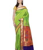 Green woven art silk saree with blouse