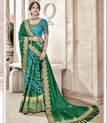 Green embroidered silk blend saree with blouse