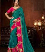 Green embroidered silk blend saree with blouse