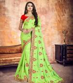 Light green embroidered silk saree with blouse