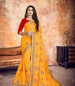 Orange embroidered silk saree with blouse