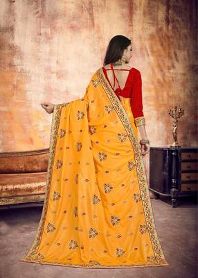 Orange embroidered silk saree with blouse 2
