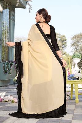 Beige embroidered georgette saree with blouse 2