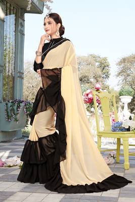 Beige embroidered georgette saree with blouse 4