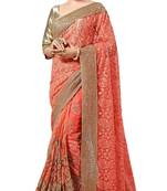 Light orange embroidered net saree with blouse