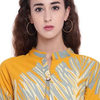 Yellow printed rayon kurtas-and-kurtis 5