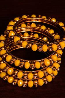 Dark Yellow Beaded and Zircon Stone Embellished Two Pairs of Designer Bangles for Women  