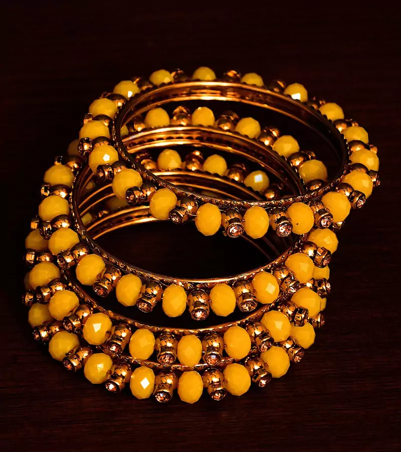 Dark Yellow Beaded and Zircon Stone Embellished Two Pairs of Designer Bangles for Women  