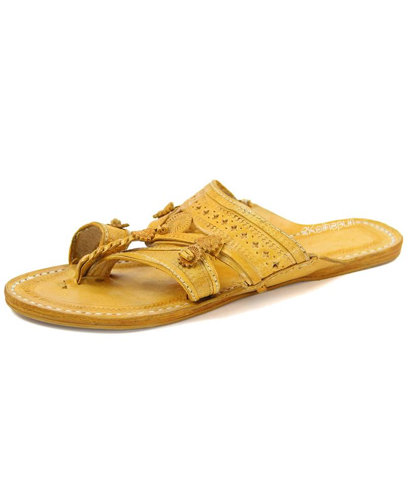 nike gold and black shoes