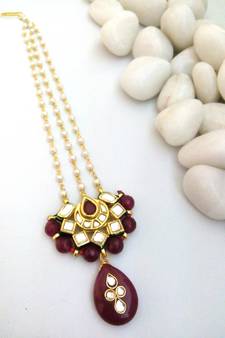 red ruby kundan maang tikka