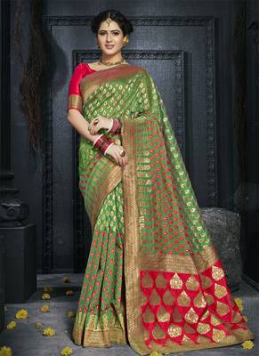 Green woven art silk blend saree with blouse 1