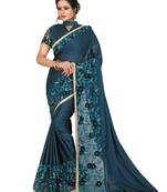 Blue embroidered satin saree with blouse